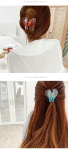 Transparent heart hair claw detail shot, cute resin shark clip for stylish daily hair styling.