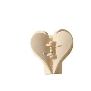 Matte heart hair claw clip, chic cream white acrylic shark clip for cute hairstyles.