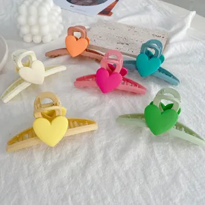 Macaron color heart hair claw clip detail, cute sweet large hair accessory styling view