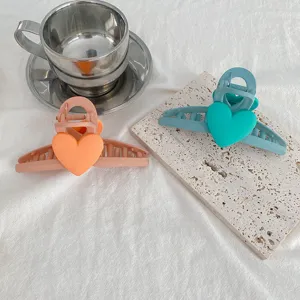 Macaron color sweet heart hair claw clip large shark clip hair accessory detail view.