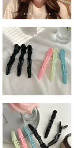 Professional seamless hair clips and duckbill styling pins for makeup and hairdressing.