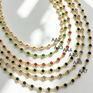 Gold-plated colorful cubic zirconia bezel station chain jewelry making detail view.