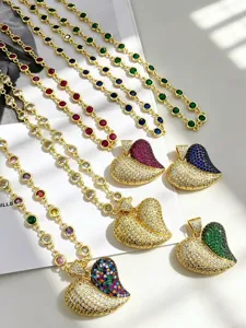 Gold-plated colorful cubic zirconia heart pendant necklaces and matching station chain set.