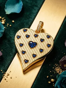 Gold heart pendant detail, striped texture with blue cubic zirconia stones, luxury DIY accessory.