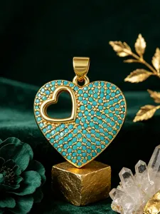 Turquoise micro-pave heart pendant close-up, golden hollow design jewelry accessory DIY detail.