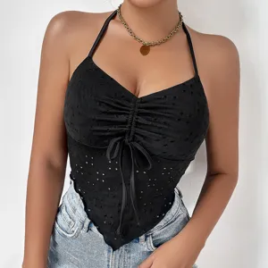 Black halter eyelet camisole top featuring front drawstring and irregular hemline design.