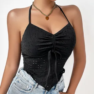 Detailed view of women's black halter neck eyelet embroidery crop top with ruched drawstring design.