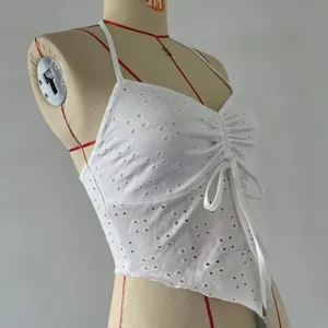 White eyelet halter camisole top with chest ruching, drawstring tie and irregular hem style.
