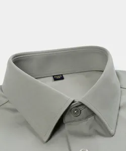 Solid color men's long sleeve business casual dress shirt classic small collar detail.