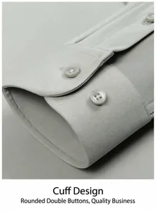 Men's solid color long sleeve business dress shirt cuff detail view, premium button design.