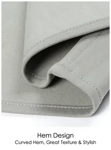 Detailed view of the men's casual shirt hem, featuring premium grey stretchy fabric.
