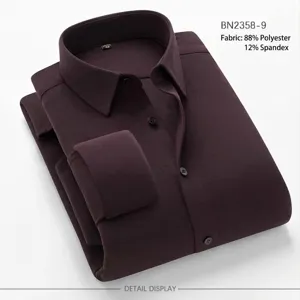 Detailed view of a folded dark purple men's long sleeve shirt showing premium fabric texture.