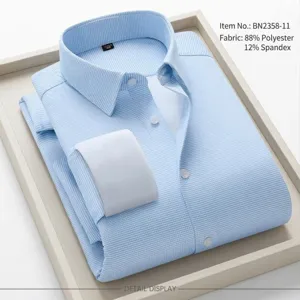 Men's long sleeve check dress shirt, professional business casual button-down top detail view.