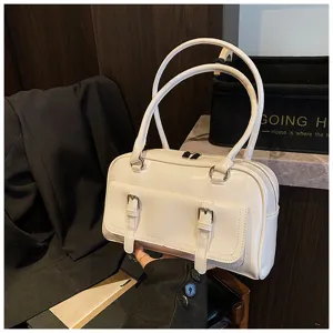 White patent leather shoulder bag for women, stylish commuting pillow bag with double handles.