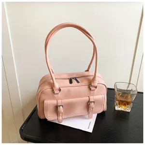 Pink oiled leather commuter shoulder bag, trendy pillow bag with front buckle pocket.