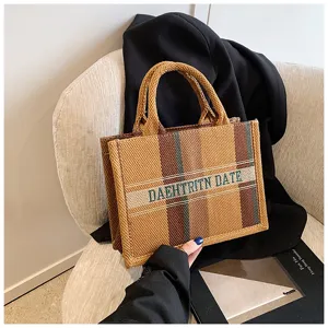 Stilvolle gestreifte Canvas-Tragetasche für Damen, lässige Umhängetasche für den Alltag.