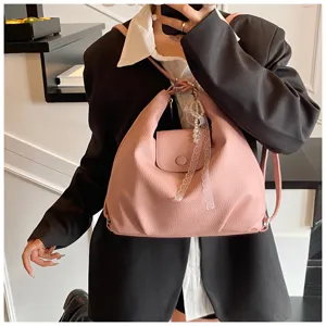 Pink leather convertible backpack handbag for women, casual daily tote with cute lace pearl pendant.