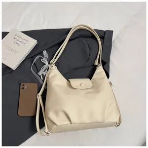 Stylish casual beige PU leather women shoulder bag large capacity daily commute tote backpack.