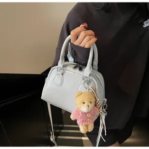 Borsa a mano Boston azzurro chiaro da donna, elegante borsa a tracolla in pelle PU con orsetto.