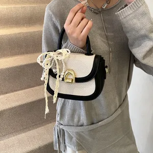 Elegante bolso de silla tejido para mujer negro y blanco bolso de hombro cruzado moda diario.