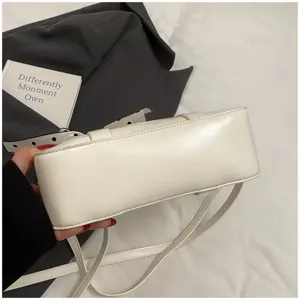 White minimalist PU leather shoulder crossbody bag detail view, simple versatile daily purse.