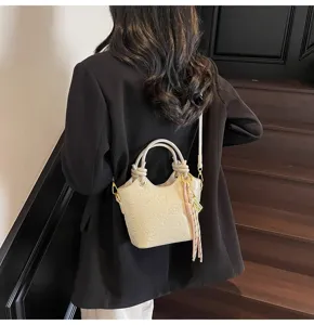 Vintage casual bucket bag for women, stylish PU leather shoulder and crossbody bag with details.