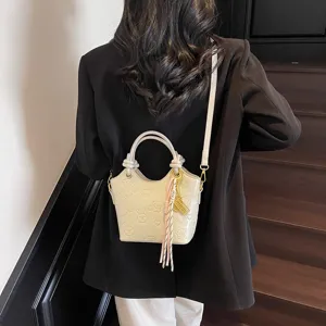 Retro casual handbag bucket bag women chic PU leather shoulder crossbody bag with cute embossing.