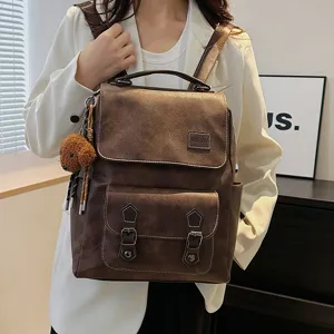 Sac à dos rétro en cuir marron pour femmes, grande capacité cartable vintage voyage quotidien.