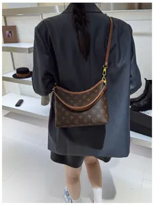Fashion brown monogram shoulder bag for women, retro crescent crossbody bag with top handle.
