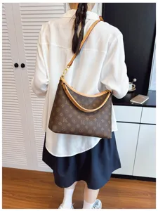 Women's vintage brown monogram shoulder bag, stylish large capacity hobo crossbody bag.