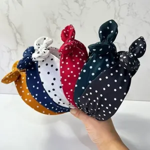 Retro polka dot bow headband for women, stylish wide brim hair hoop, versatile hair accessories.