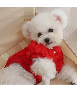 Close-up detail of a soft red fleece pet sweater designed for small dogs like Bichon and Teddy.