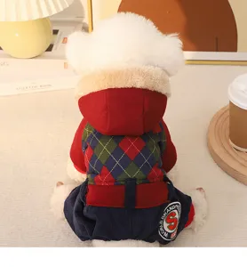 Cozy winter dog hoodie with argyle plaid pattern, warm four-legged fleece apparel detail.