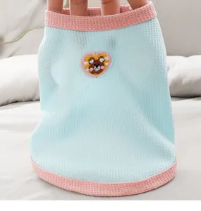 Summer blue waffle pet vest with pink trim and cute heart bear patch for small dogs.