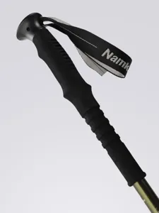 Outdoor trekking pole with ergonomic non-slip handle and adjustable strap for hiking adventures.