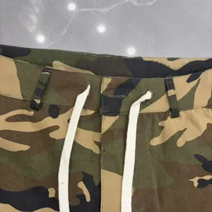 Camouflage cargo shorts for men and women, casual streetwear style with adjustable drawstring.