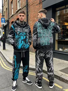 Men's streetwear zip hoodie and sweatpants set with vintage wash and graphics.