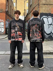 Vintage washed long sleeve t-shirt with heavy graphic print, oversized streetwear style.