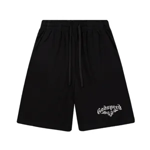 Short decontracté noir avec taille cordon et imprimé graphique tête de mort gothic.