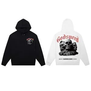 Close-up detail view of gothic text print and skull graphic on streetwear hoodie back.