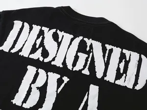 Vintage washed black streetwear t-shirt with distressed white back graphic print detail.