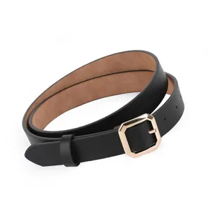 Detailed view of women's black PU leather belt with geometric gold metal buckle accessory.