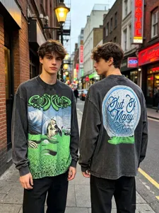Vintage washed long sleeve t-shirt featuring graphic skeleton and letter prints for men.