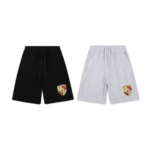 Shorts streetwear décontractés pour hommes et femmes avec cordon élastique et logo cool.