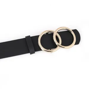 Women fashion black leather belt detail featuring modern double gold metal ring buckle.