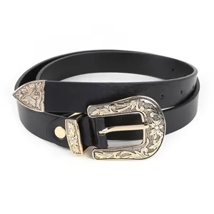 Detailed shot of a vintage women's PU leather belt with ornate western gold metal buckle set.