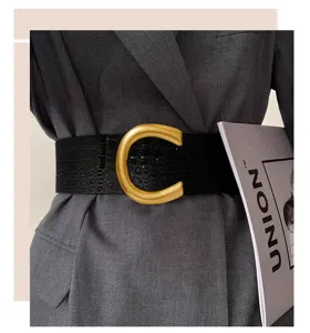 Wide black crocodile texture belt with bold gold C buckle stylish vintage waist accessory.
