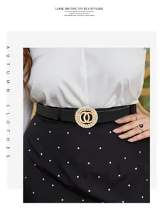 Detail shot of women black leather belt with sparkling rhinestone double ring buckle for dresses.