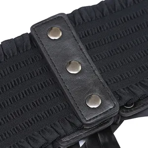 Womens black wide elastic waist belt cincher with faux leather snap button front detail.