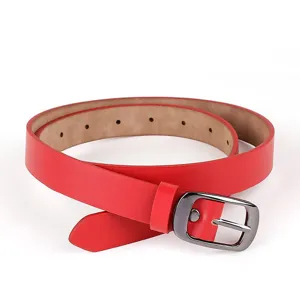 Red women's casual leather belt with metal buckle, stylish daily wear accessory detail view.